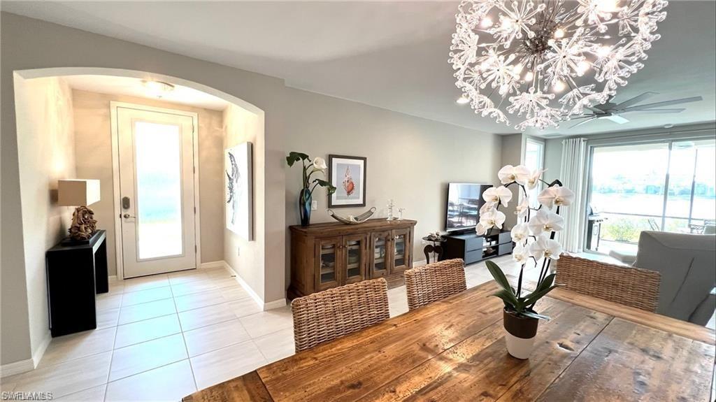 14827 Edgewater Circle Naples, FL 34114 - Photo 10 of 32 a living room with furniture