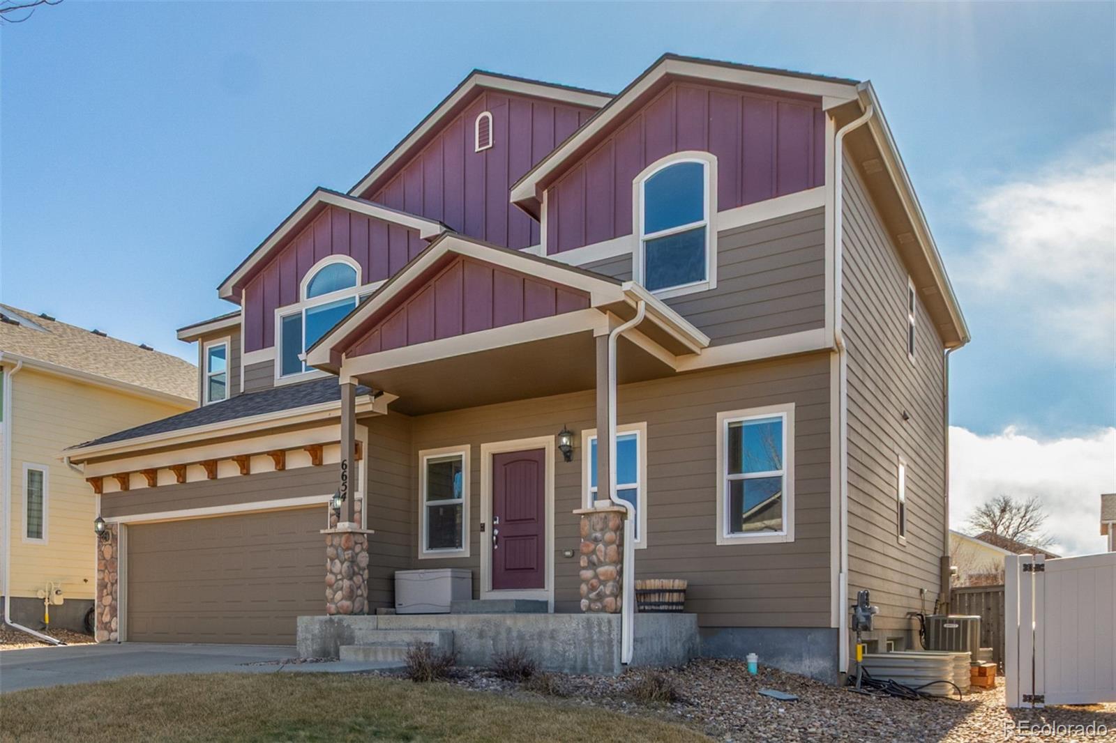 6654 12th Street Frederick, CO 80530 - Photo 1 of 50 a front view of a house