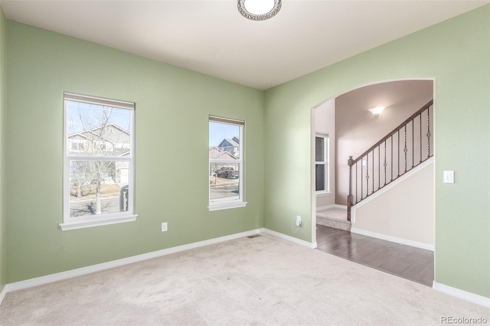 6654 12th Street Frederick, CO 80530 - Photo 6 of 50 a view of an empty room with a window