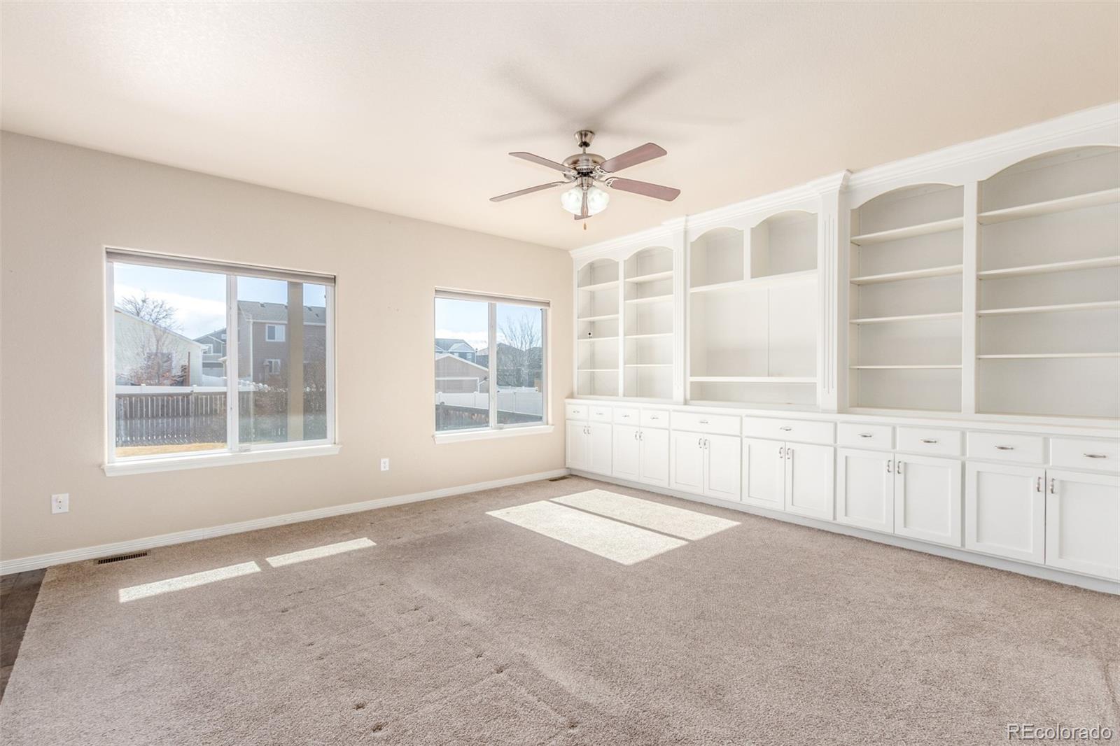 6654 12th Street Frederick, CO 80530 - Photo 7 of 50 a view of an empty room with a window