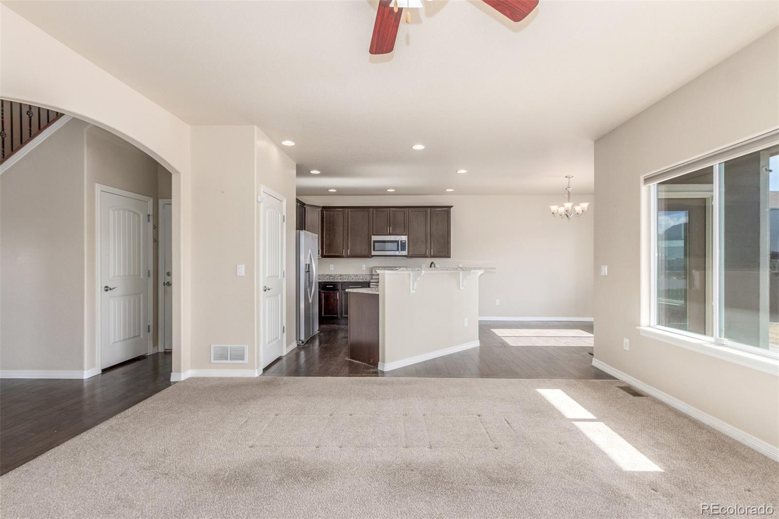 6654 12th Street Frederick, CO 80530 - Photo 9 of 50 a view of a kitchen with a sink cabinets and a window