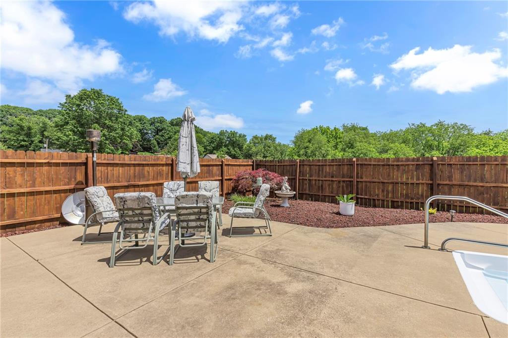 303 Sharon Grange Road Aliquippa, PA 15001 - Photo 41 of 50 Great space for dining and relaxing by the pool.