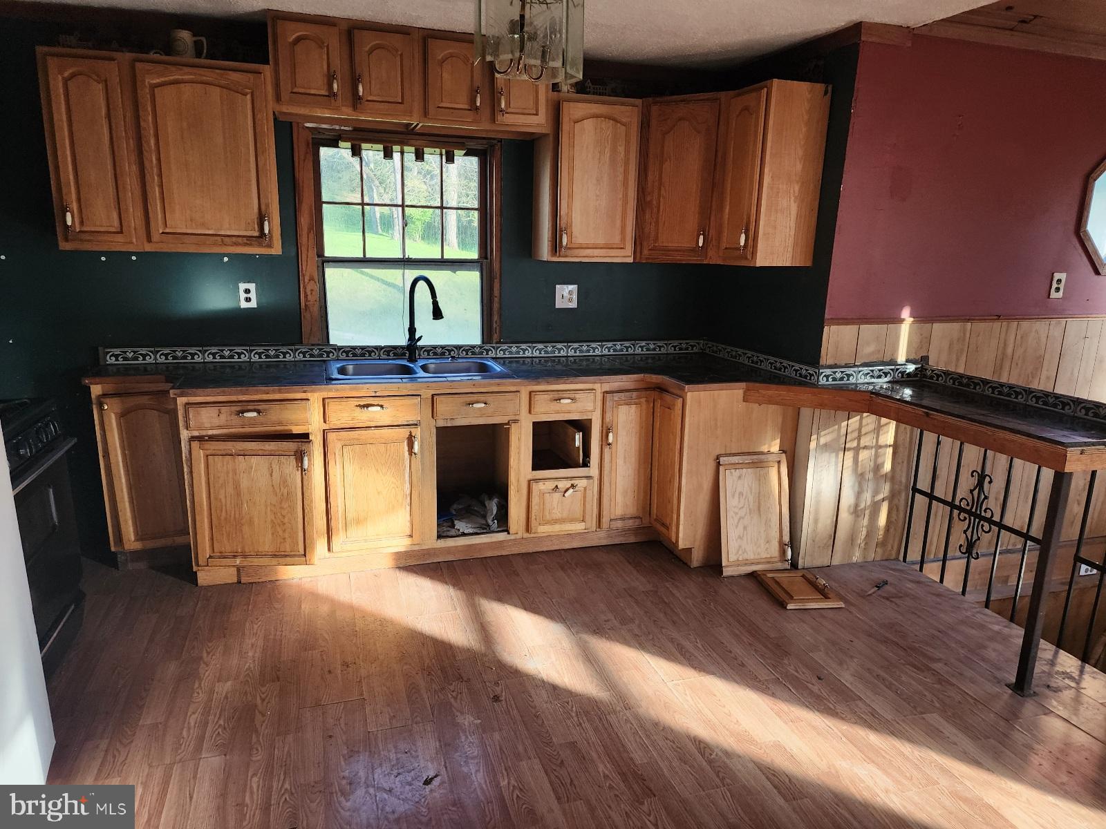 466 Kirks Mill Road Nottingham, PA 19362 - Photo 12 of 28 a kitchen with stainless steel appliances granite countertop a stove a sink and a microwave
