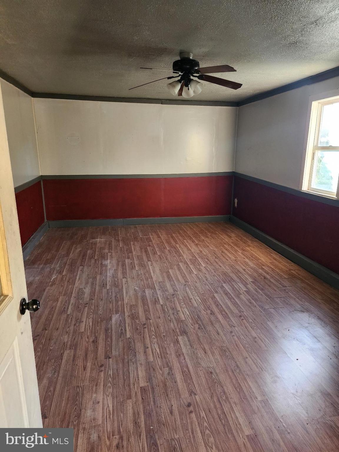 466 Kirks Mill Road Nottingham, PA 19362 - Photo 15 of 28 a view of a room with wooden floor and windows