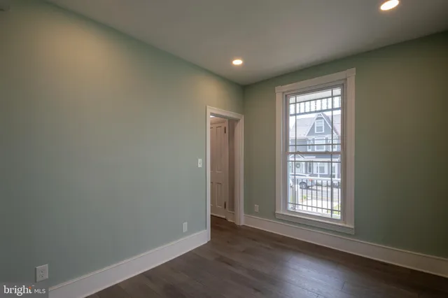 a view of an empty room and window