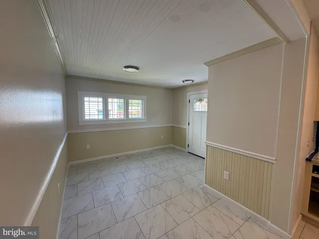 a view of an empty room with window