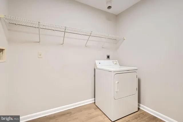 a view of a balcony with wooden floor
