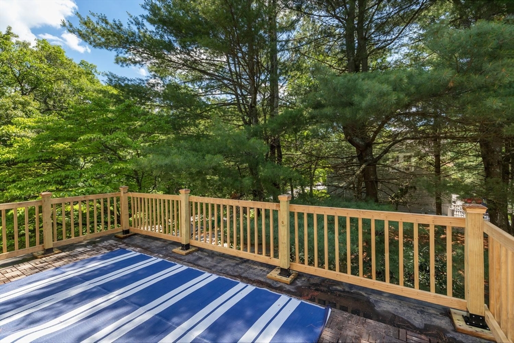 114 South Border Road Medford, MA 02155 - Photo 21 of 36 a view of a wooden roof deck