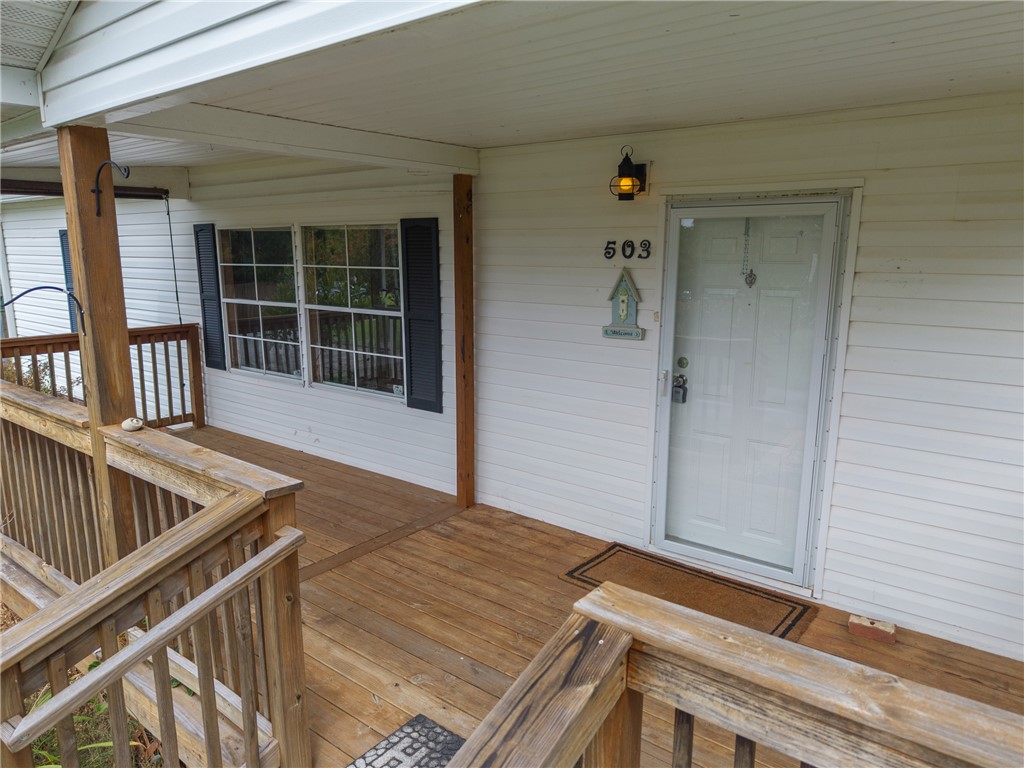 503 Mulliken Road Central, SC 29630 - Photo 4 of 50 The front porch features natural wood decking and convenient side access.