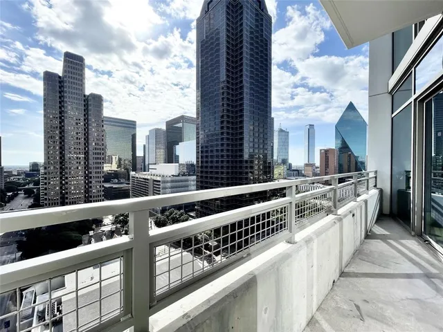 a kitchen with stainless steel appliances a stove and cabinets