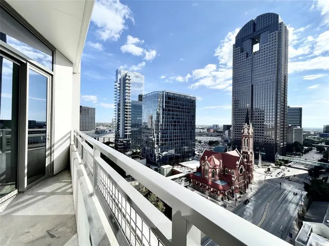 a view of city with tall buildings