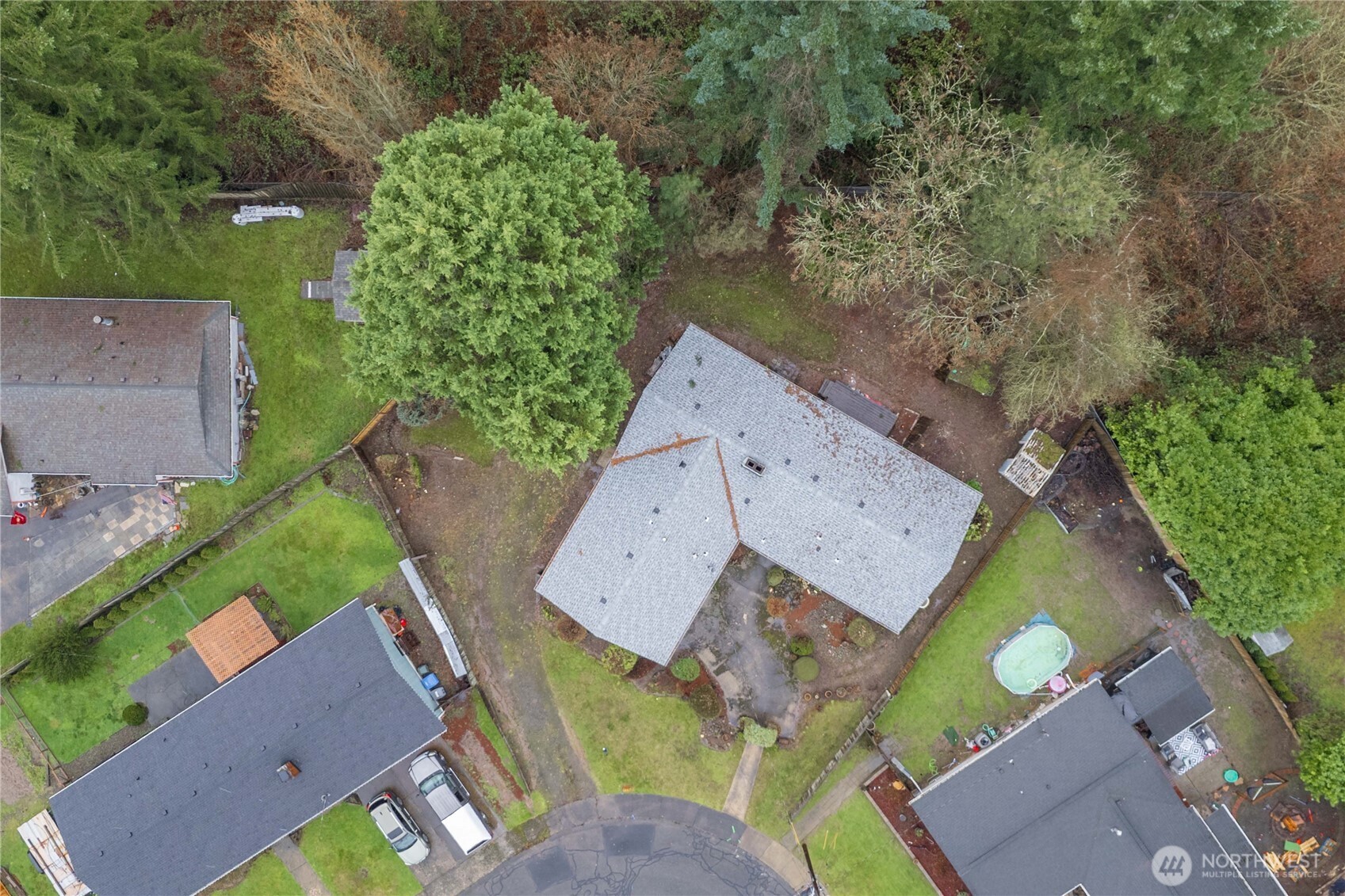 152 Christina Drive Sumner, WA 98390 - Photo 2 of 26 an aerial view of a house with a yard and a large tree
