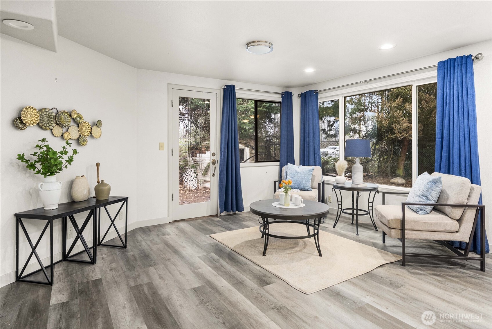152 Christina Drive Sumner, WA 98390 - Photo 8 of 26 a living room with furniture and a wooden floor