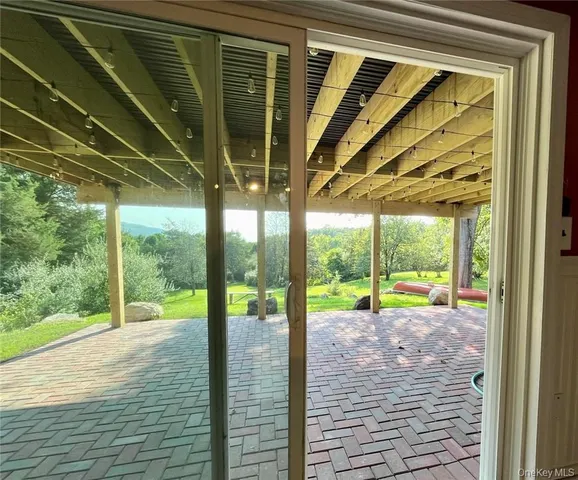 a view of porch with a garden