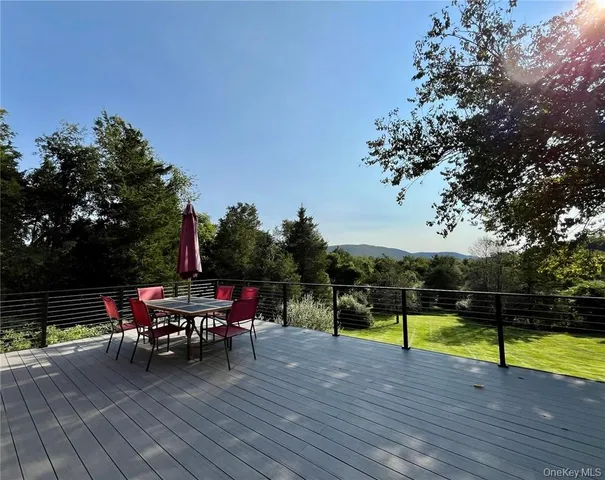 a view of a park with sitting area