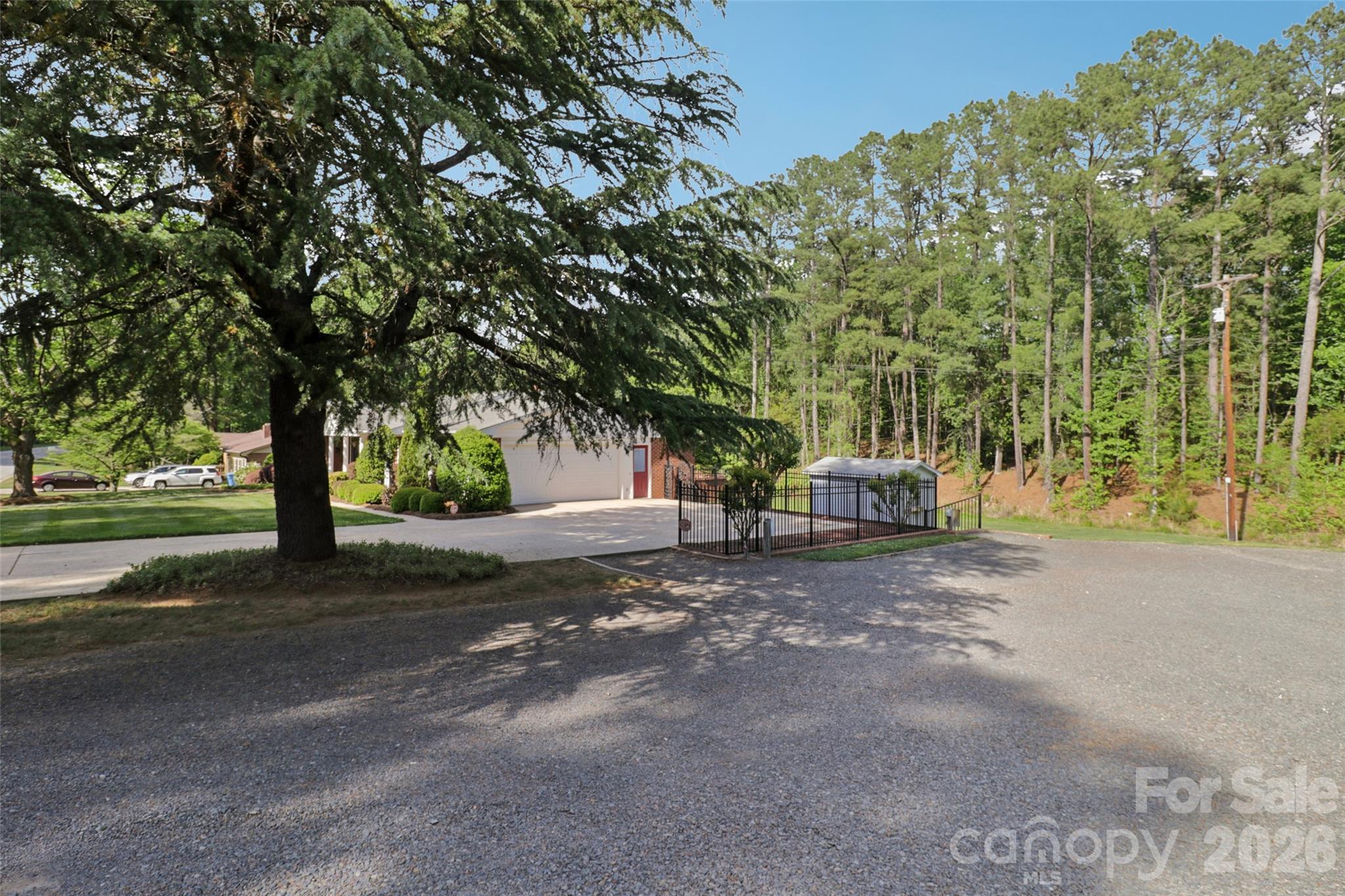 1002 Ridge Street Albemarle, NC 28001 - Photo 37 of 45 a view of a tree in front of a house