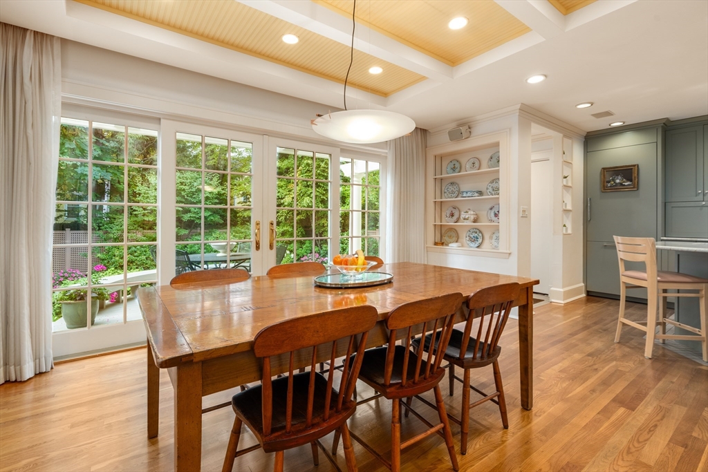 26 Healey Street Cambridge, MA 02138 - Photo 12 of 24 a view of a dining room with furniture window and wooden floor