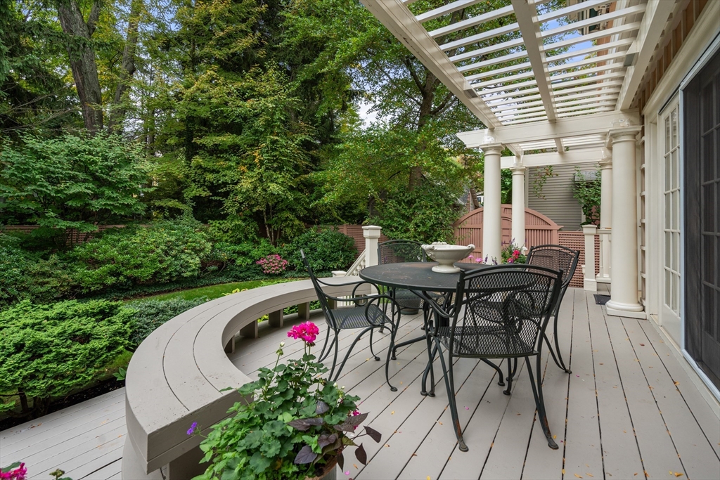26 Healey Street Cambridge, MA 02138 - Photo 19 of 24 a view of a table and chairs in patio of the house
