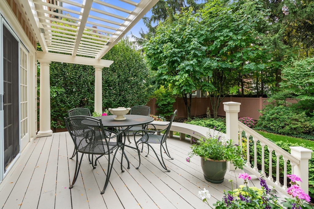 26 Healey Street Cambridge, MA 02138 - Photo 20 of 24 a view of a table and chairs in patio
