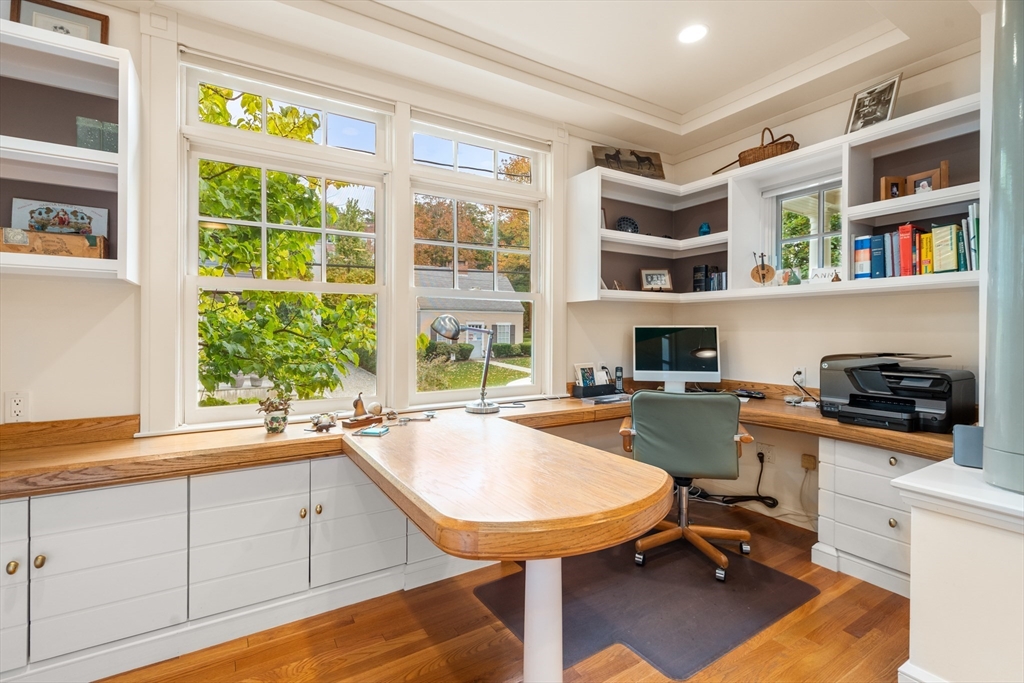 26 Healey Street Cambridge, MA 02138 - Photo 7 of 24 a view of a workspace with furniture and a window