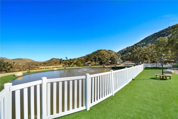 a view of a lake with a mountain in the background