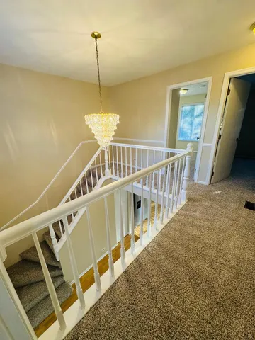 a view of a balcony with staircase