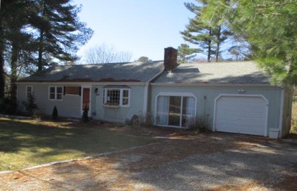 445 Nye Road Centerville, MA 02632 - Photo 1 of 7 a view of a house with a yard