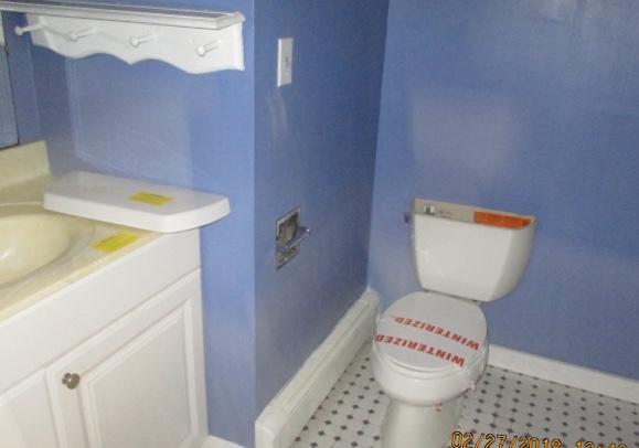 445 Nye Road Centerville, MA 02632 - Photo 5 of 7 a bathroom with a sink toilet and a shower