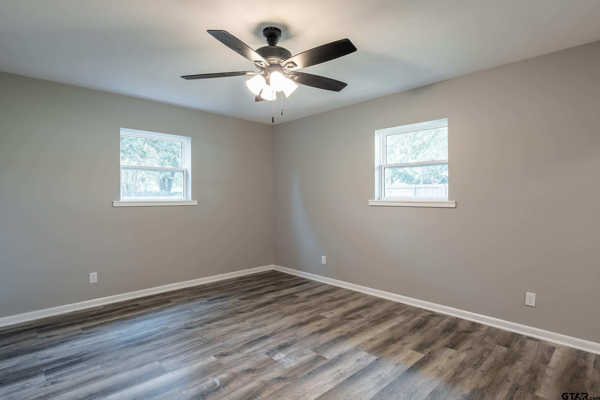 2201 King Road Jacksonville, TX 75766 - Photo 11 of 24 a view of empty room with wooden floor