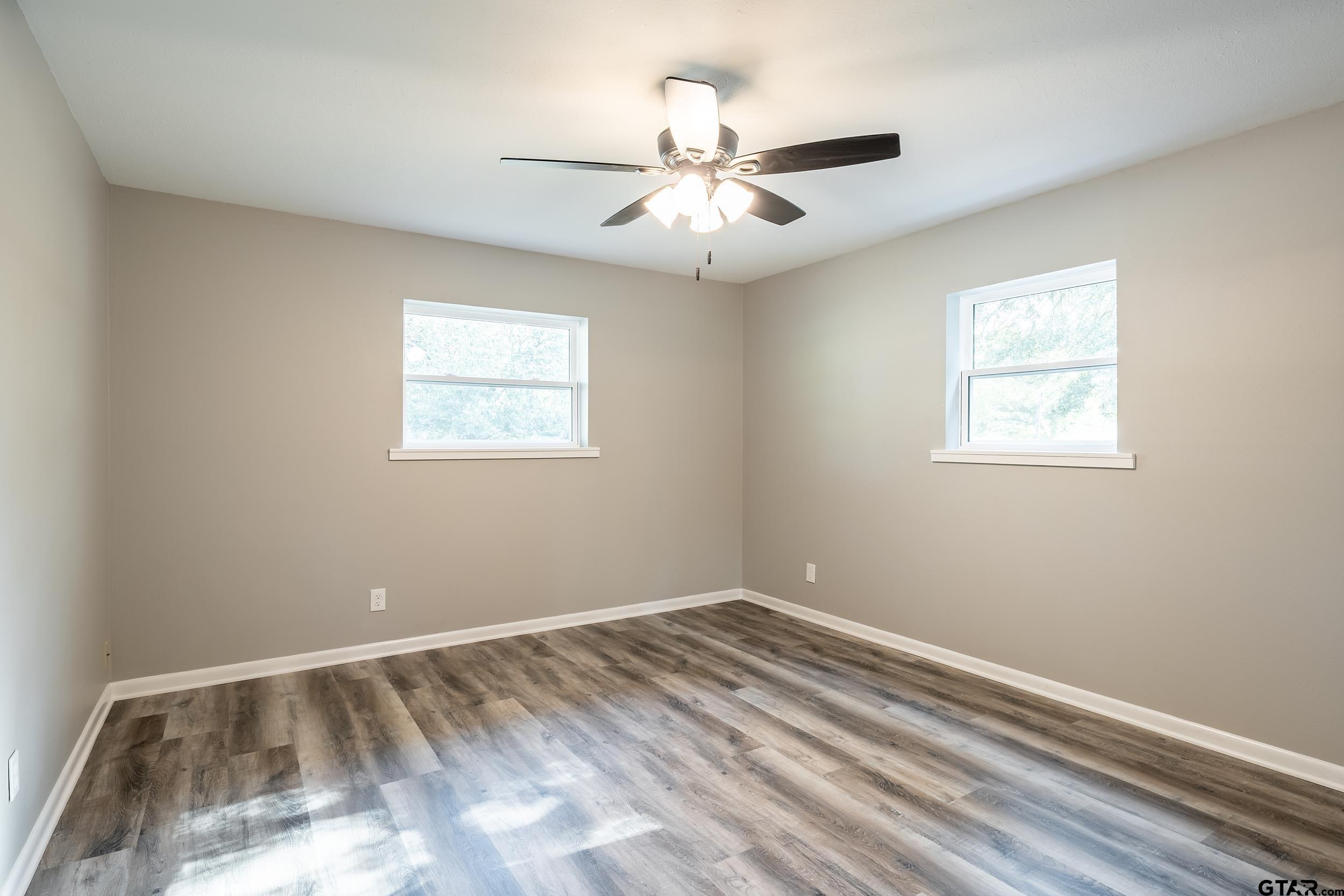 2201 King Road Jacksonville, TX 75766 - Photo 16 of 24 a view of room with window and ceiling fan