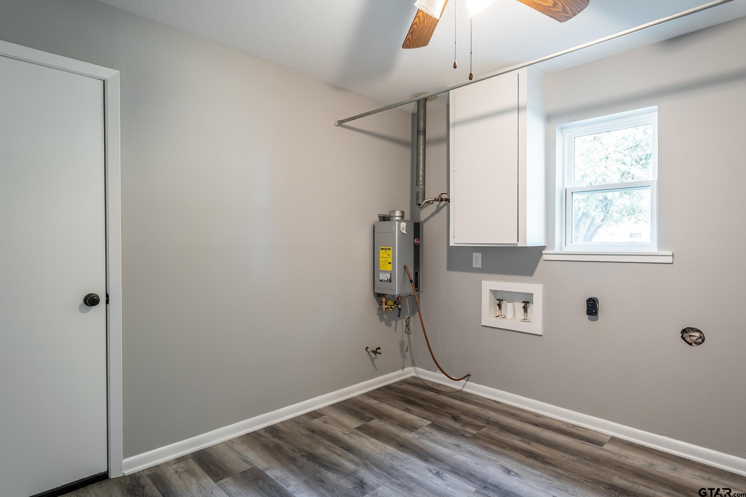 2201 King Road Jacksonville, TX 75766 - Photo 18 of 24 a view of an empty room with a window