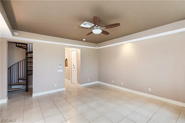 a view of gallery with wooden floor