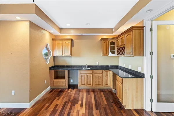 a view of a livingroom with wooden floor