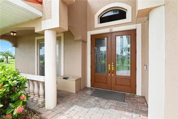 a front view of a house with a large window