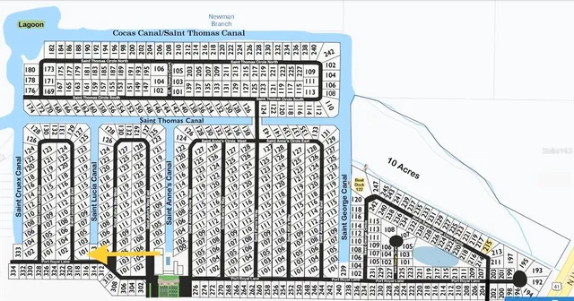 a view of a large building and a wooden wall