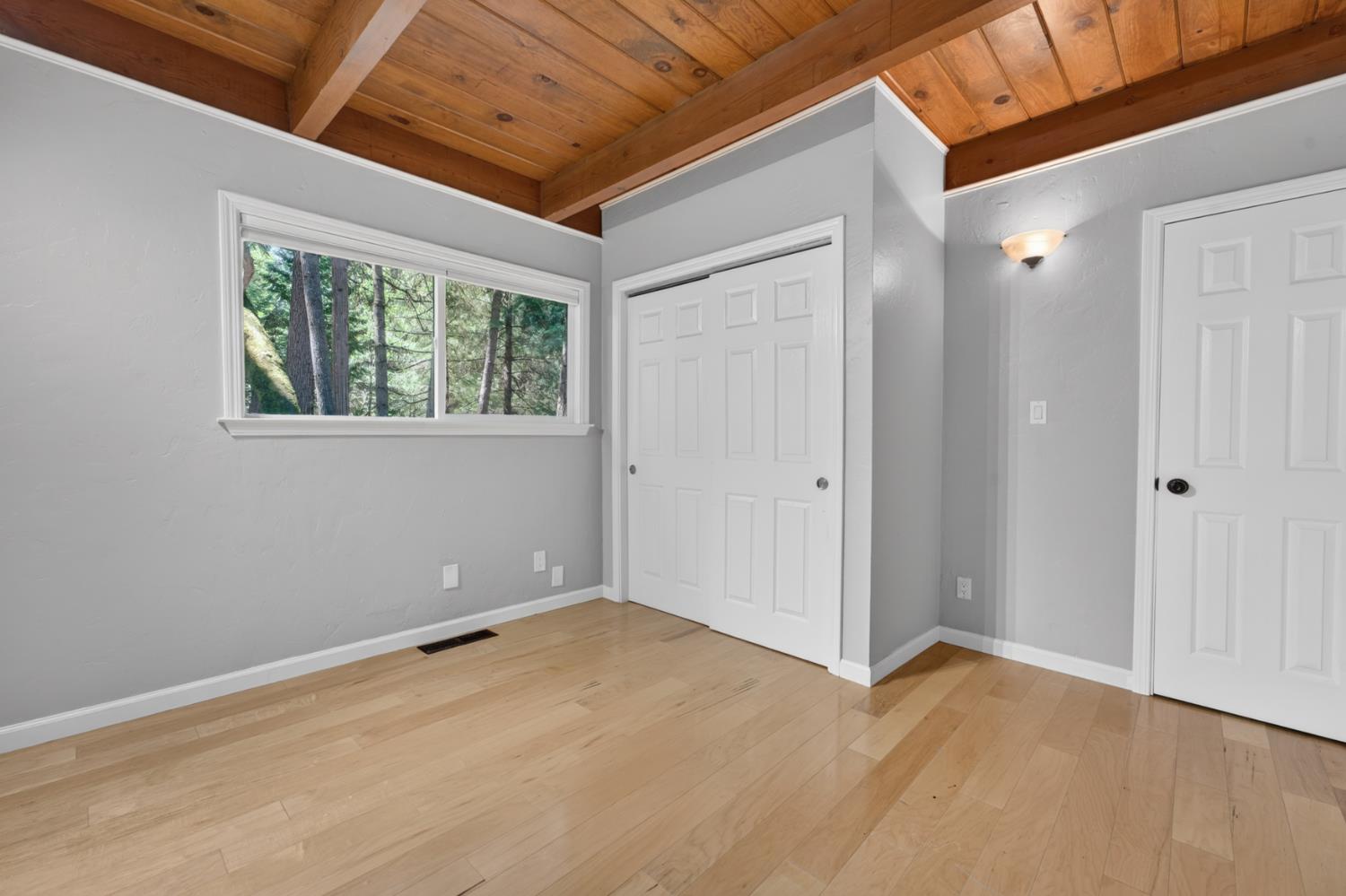 4340 Fairglade Road Placerville, CA 95667 - Photo 20 of 42 a view of an empty room with a window