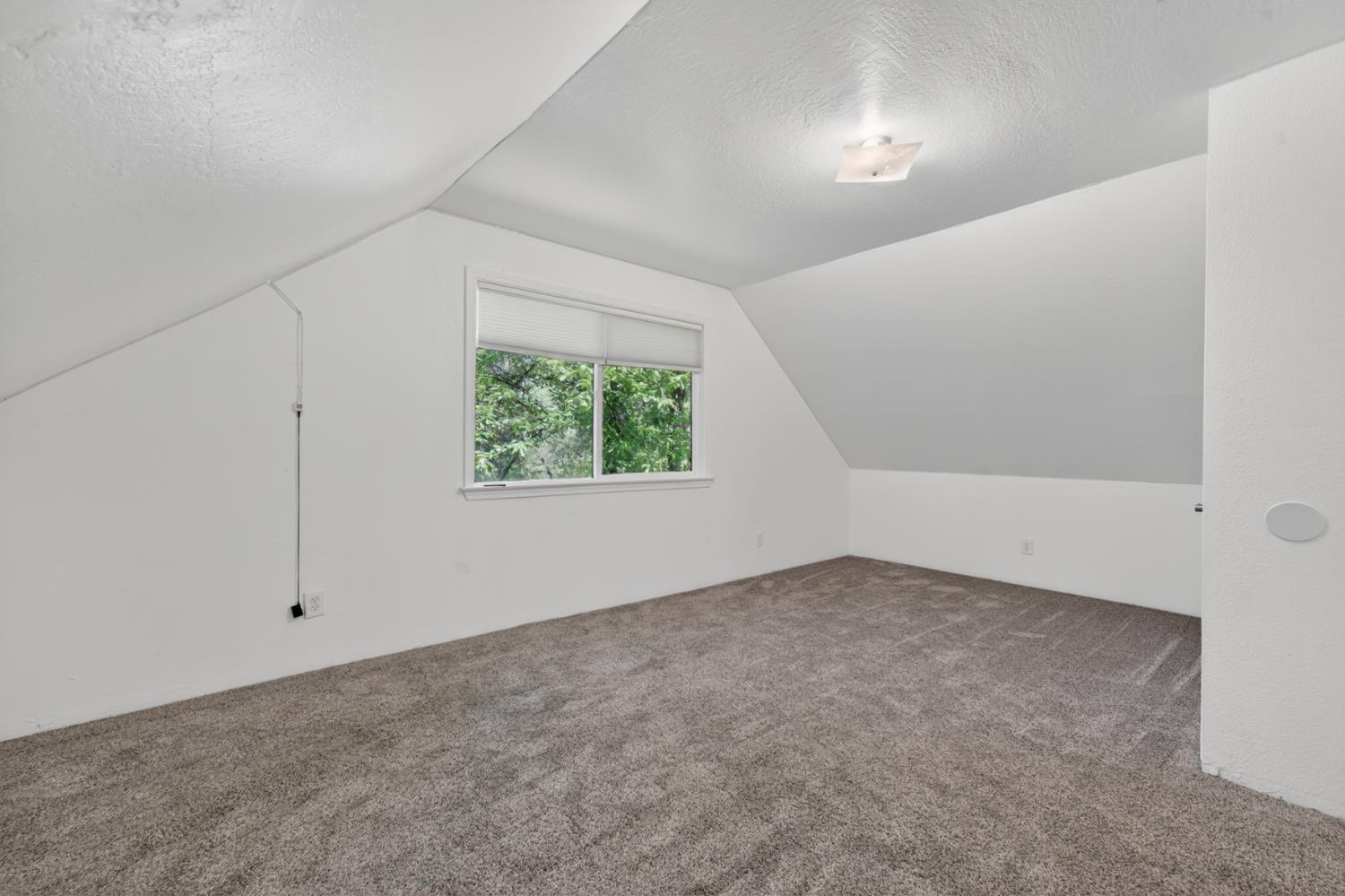 4340 Fairglade Road Placerville, CA 95667 - Photo 31 of 42 an empty room with windows