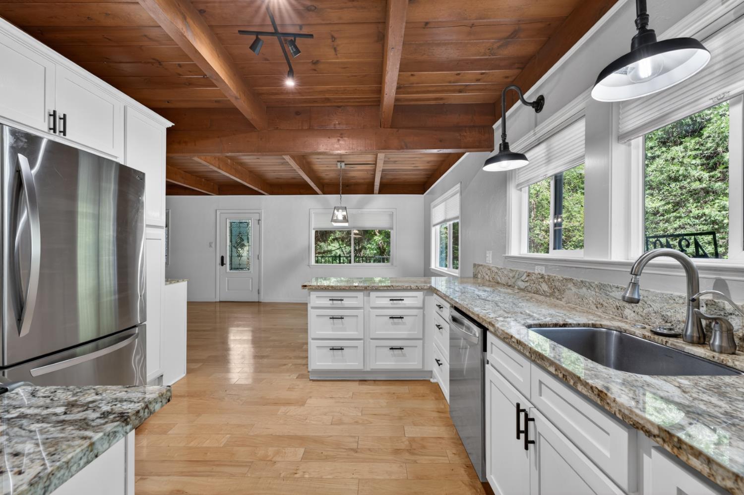4340 Fairglade Road Placerville, CA 95667 - Photo 7 of 42 a kitchen with a sink stove and refrigerator