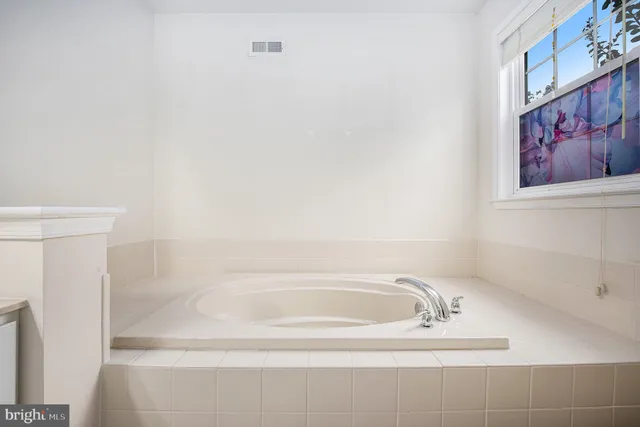 a close up of a bathtub