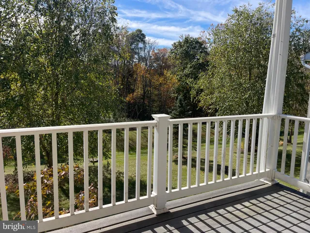 a view of a wooden fence