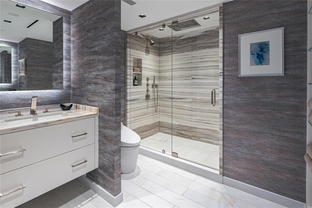 3310 Fairmount Street, Unit P3A Dallas, TX 75201 - Photo 17 of 20 a bathroom with a sink a toilet and shower