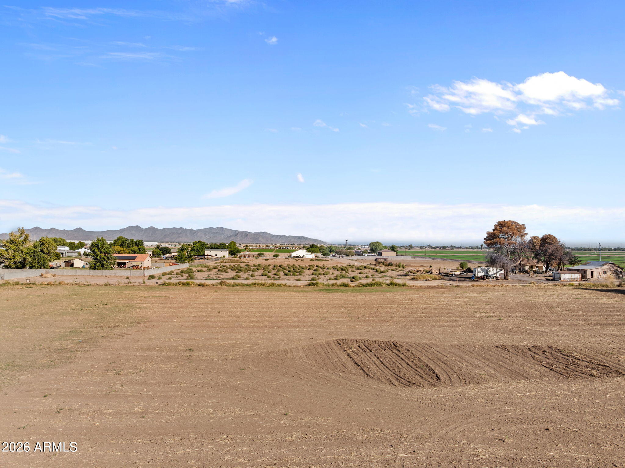 712 South X S Dean Road, Unit 1 Buckeye, AZ 85326 - Photo 6 of 8 a view of a city and an ocean