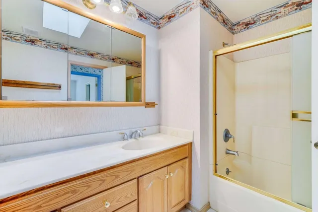 a bathroom with a sink and a bathtub