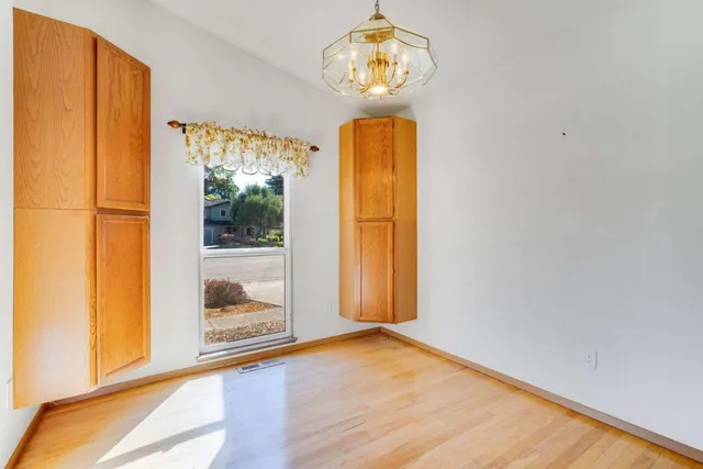 a view of a room with a chandelier