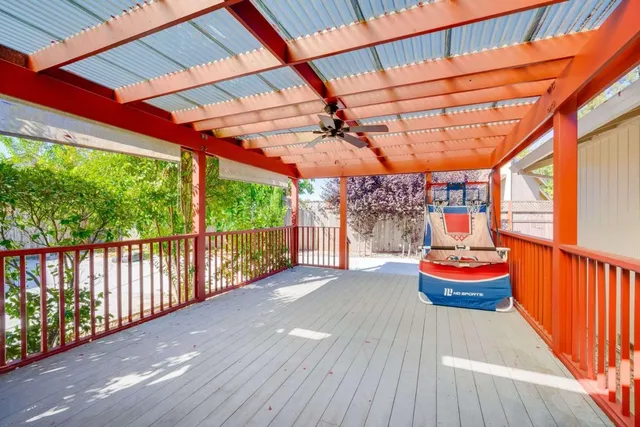 a view of a chairs and tables in patio
