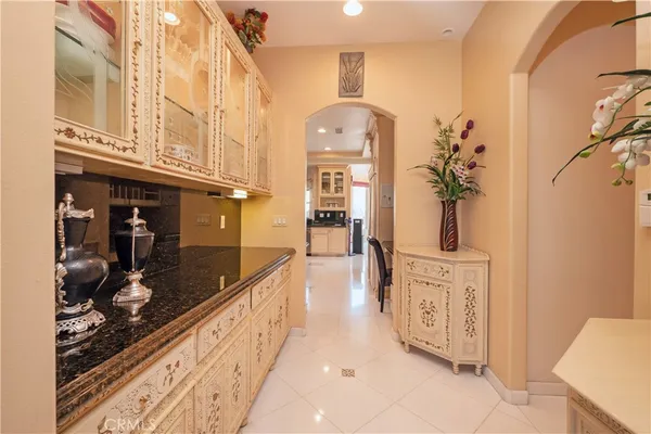 a kitchen with stainless steel appliances granite countertop a stove and a sink