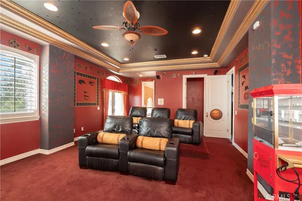 a view of a patio with a table and chairs