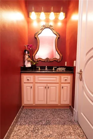 a view of a patio with dining table and chairs