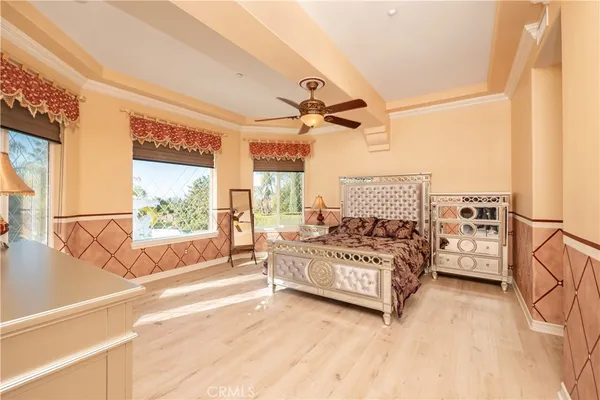 an aerial view of a house with a garden and plants