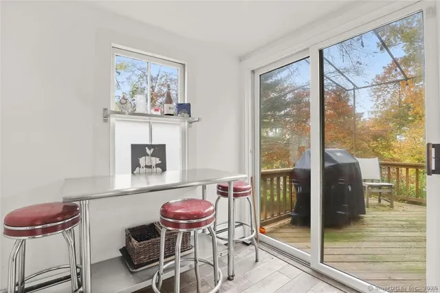 a room with a table and chairs